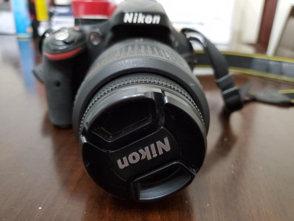 Nikon D5200 with 2 lenses, charger and battery