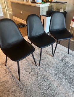 3 black Leather chairs