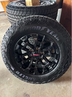4 GMC Canyon // 18” Black Factory OEM Wheels // Wrangler AT Tires