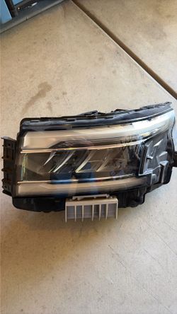 Nissan Frontier left OEM headlamp 2022 and up