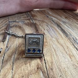 General Motors 15 Year Employee pin 10kt with 3 sapphires