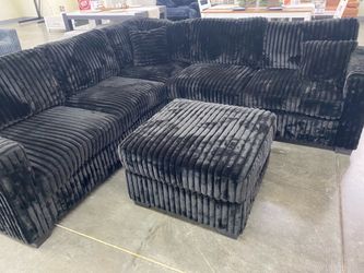 Black Onyx Plush Corduroy Sectional with ottoman and accent pillows 99x99