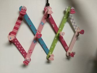 Little girl's hanger for wall