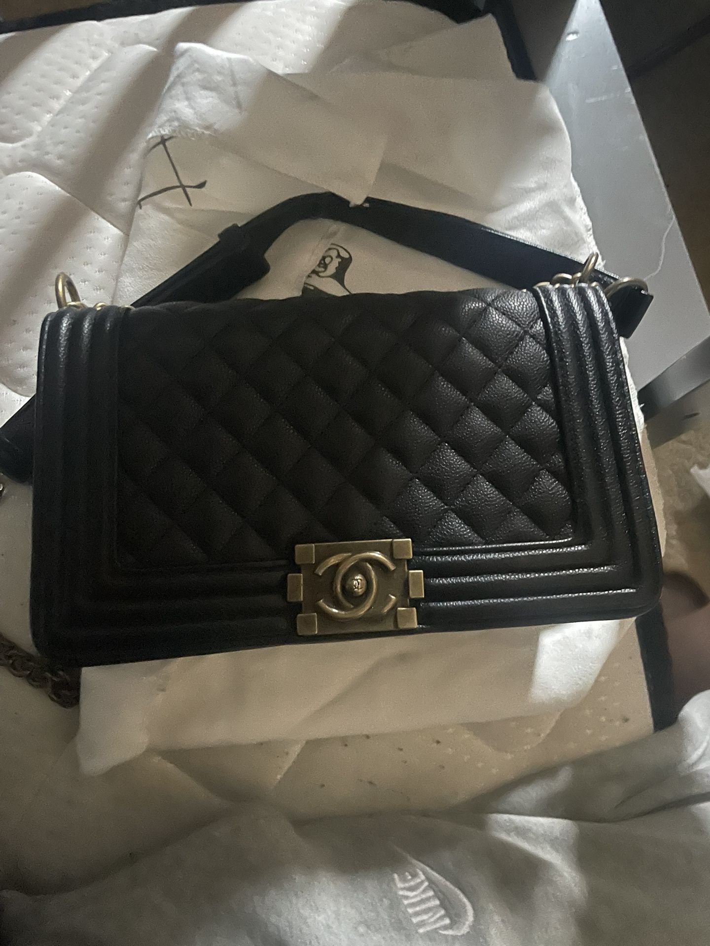 Black Chanel Flap Bag.