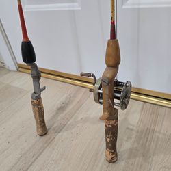 2 antique fishing poles