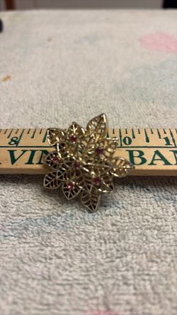 Gold Tone Filigree Flower Brooch with Red Stones