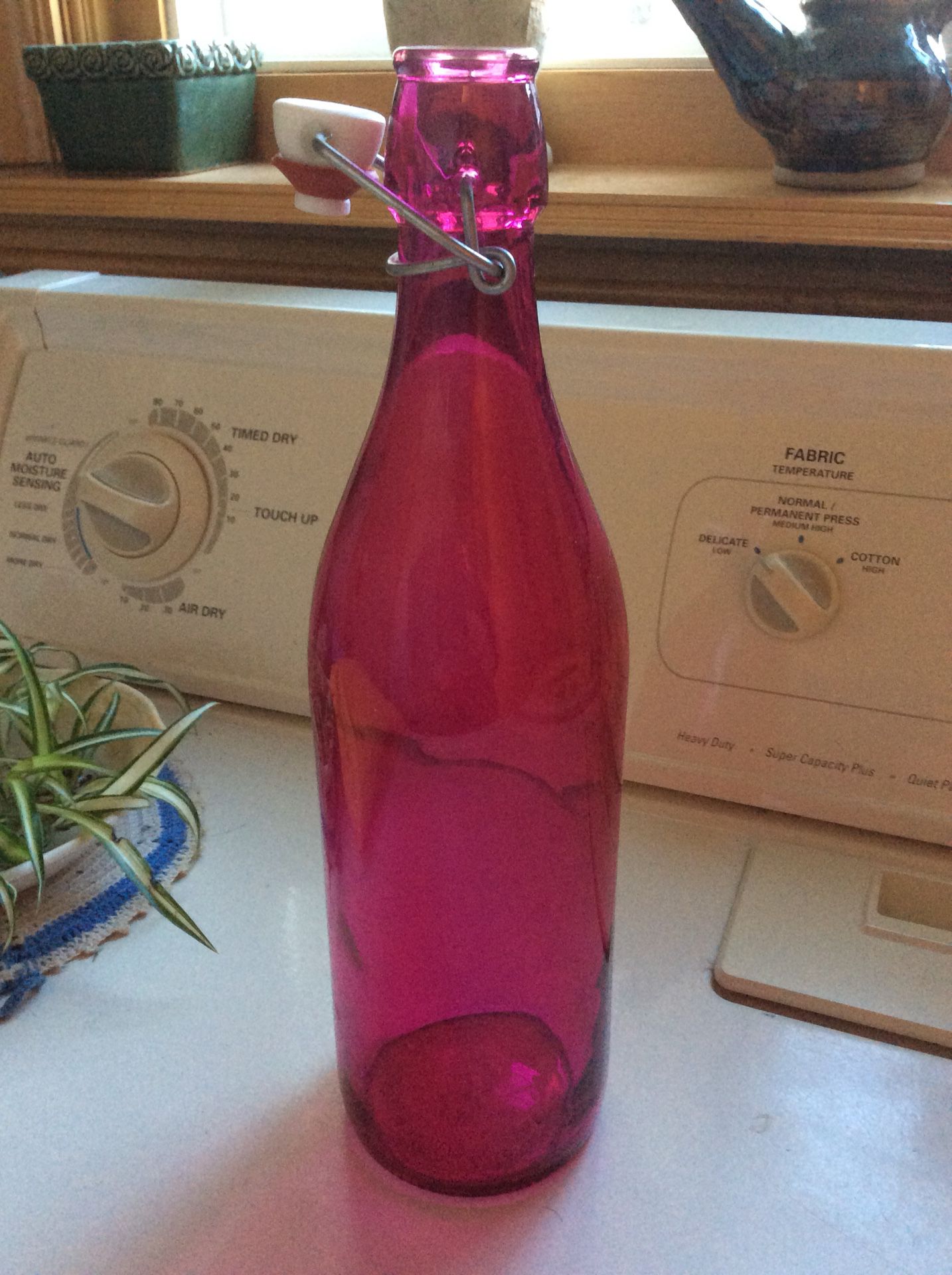 Bormioli Rocco made in Italy pink glass bottle with bale wire swing lid