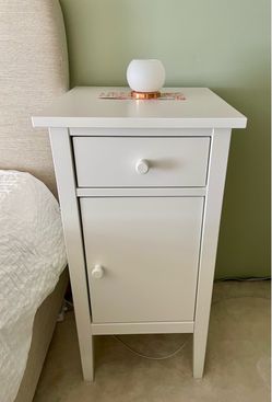 White bedside cabinet with drawer and shelves