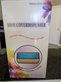 Automatic Shoe cover Dispenser.