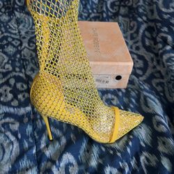 Brand New Yellow net Boot Heels Size 9