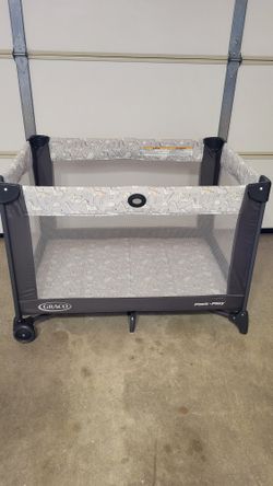 Practically New Graco Baby Playpen ( Used Once). Price Firm!