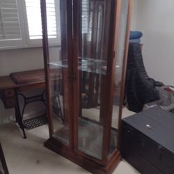 2 Curio Cabinets And One Armoire $65Each 