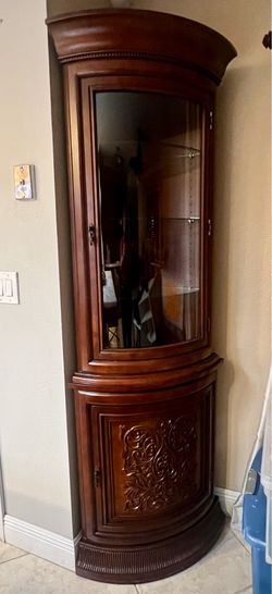 Corner curio cabinet