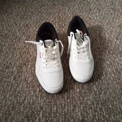 A PAIR OF LEVIS COMFORT SHOES.