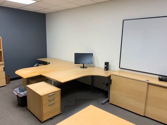 Assorted office desks and tables