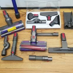 NEW cond DYSON  V10 MODEL VACUUM  , WITH ATTACHMENTS  , AMAZING POWER SUCTION  , WORKS EXCELLENT  , IN THE BOX G