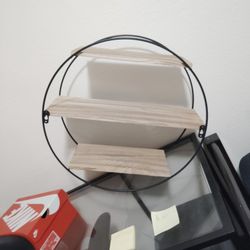 A Wooden And Metal Shelf 