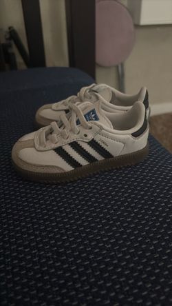 Kids Adidas Samba OG shoes.