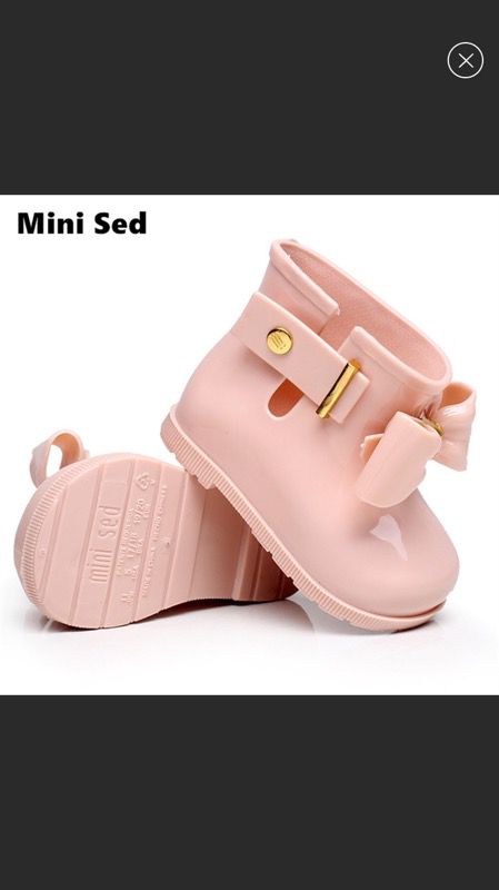 Cute pink jelly boots with minor stains