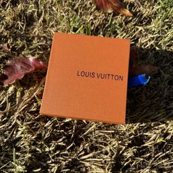 Louis Vuitton LV Initiales reversible belt in Monogram Eclipse canvas with a gold-color buckle.