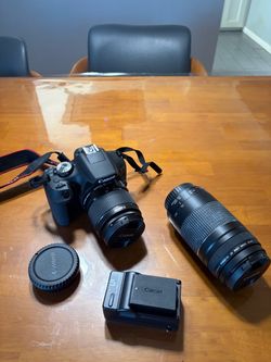Canon camera with two lens and battery (no SD card)