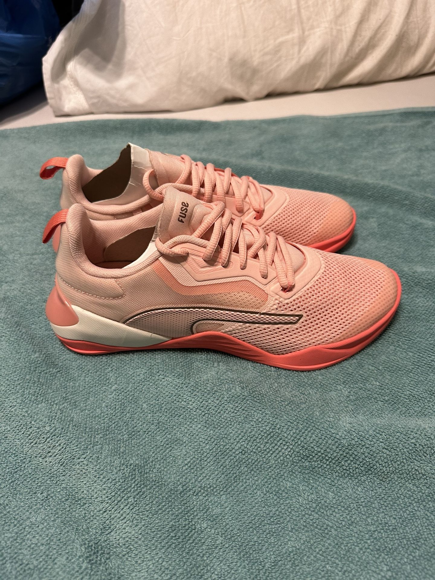 WOMENS PUMA’S SIZE 9.5 ANY PAIR FOR $35 EACH