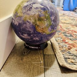 Brand New World Puzzle On A Stand