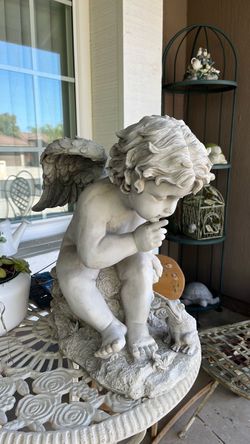 Cupid angel garden decoration. 18”” high