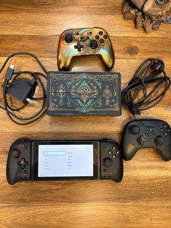 Nintendo Switch Bundle + 2 Wireless Controllers + One Game