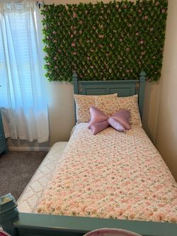 Twin Bed Frame truffle with both mattresses wall decor and dresser