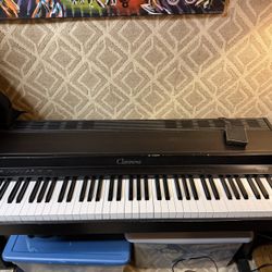 Yamaha Clavinova CLP-20 digital piano with stand. 