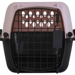 Small, pearl pink and black dog crate