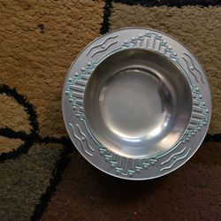 This is a classy Wilton Armetale pewter bowl in the Zia pattern from their antiquity collection. It has beautiful turquoise raised Southwestern styled