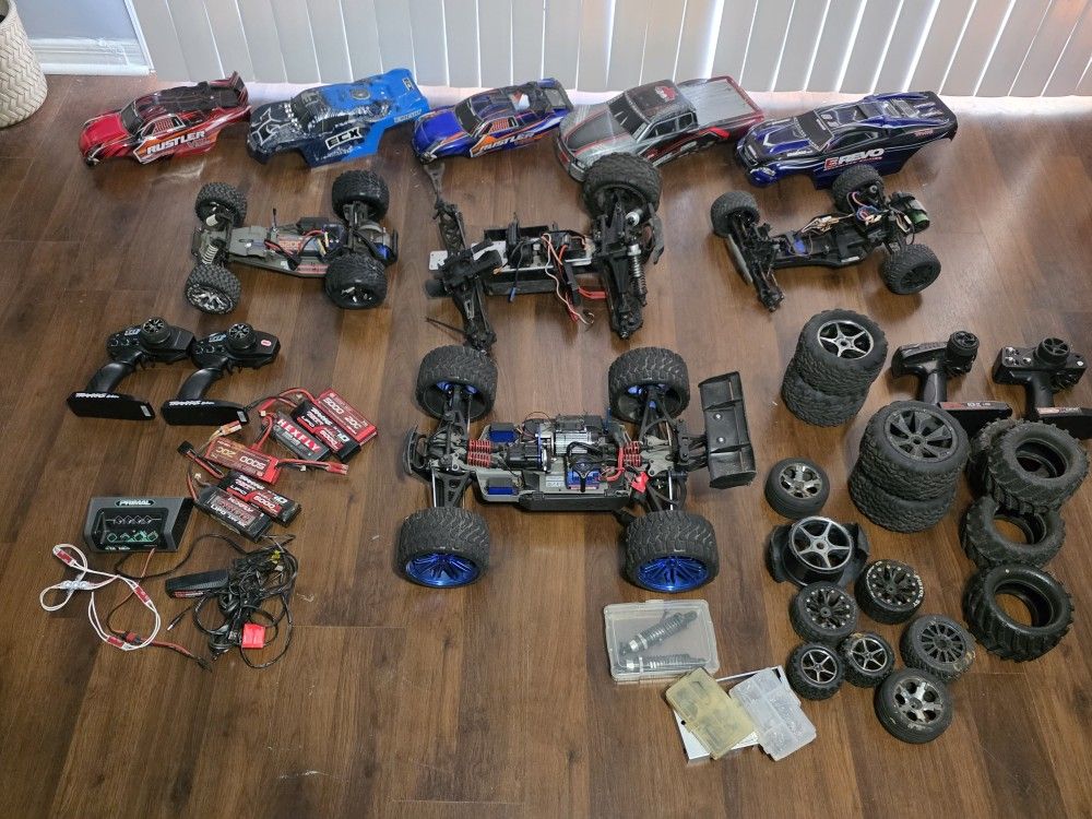 Traxxas E-Revo 1/10 RTR Huge Lot - 4 Remotes - 3 Chassis - Wheels And Batteries