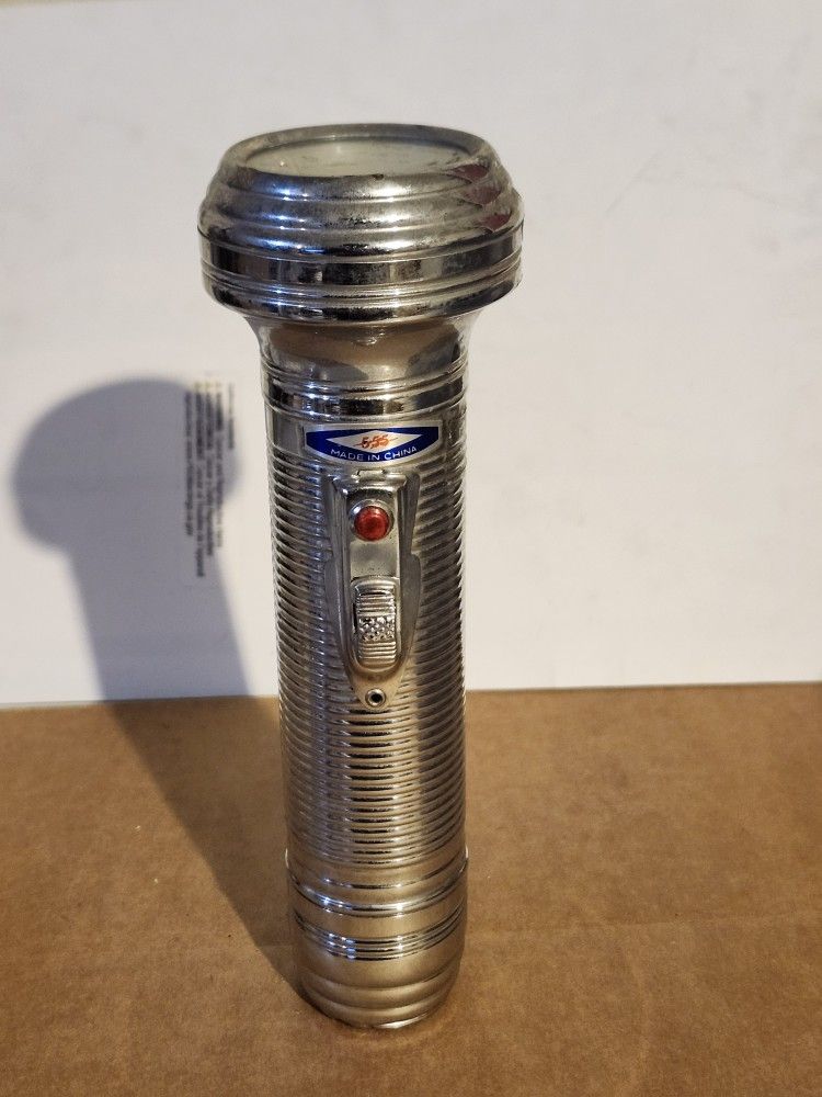 vintage Ray-O-Vac Sportsman metal flashlight.