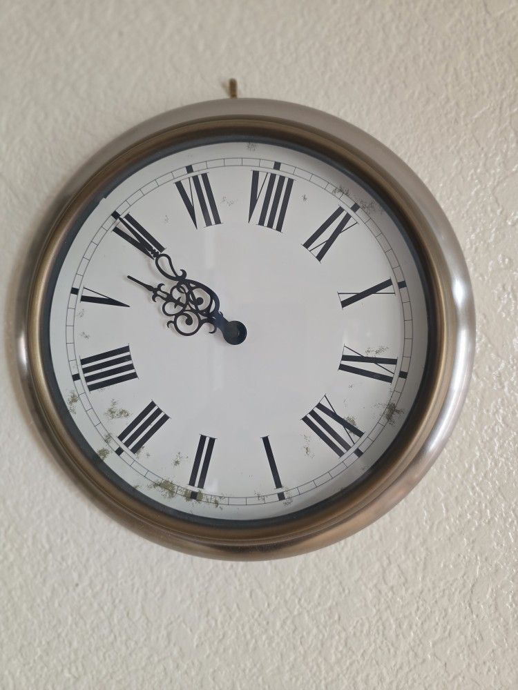 Clock. 12 Inches Across.