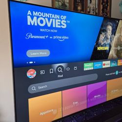 Amazon Fire TV 75" Omni Series, 4K UHD smart TV with Dolby Vision, hands-free with Alexa with a SONY Soundbar.