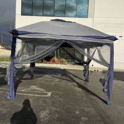 On SALE!! $85 11x11 ft Gazebo Tent with Mosquito Netting, Water Resistance. Blue And White Color