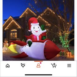 Santa On Rocket Blow Up $30