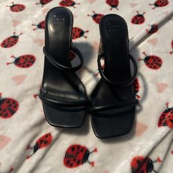 Black leather sandals