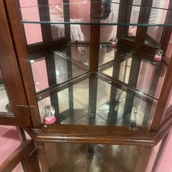 Brown Armoire W Glass Shelves And Light