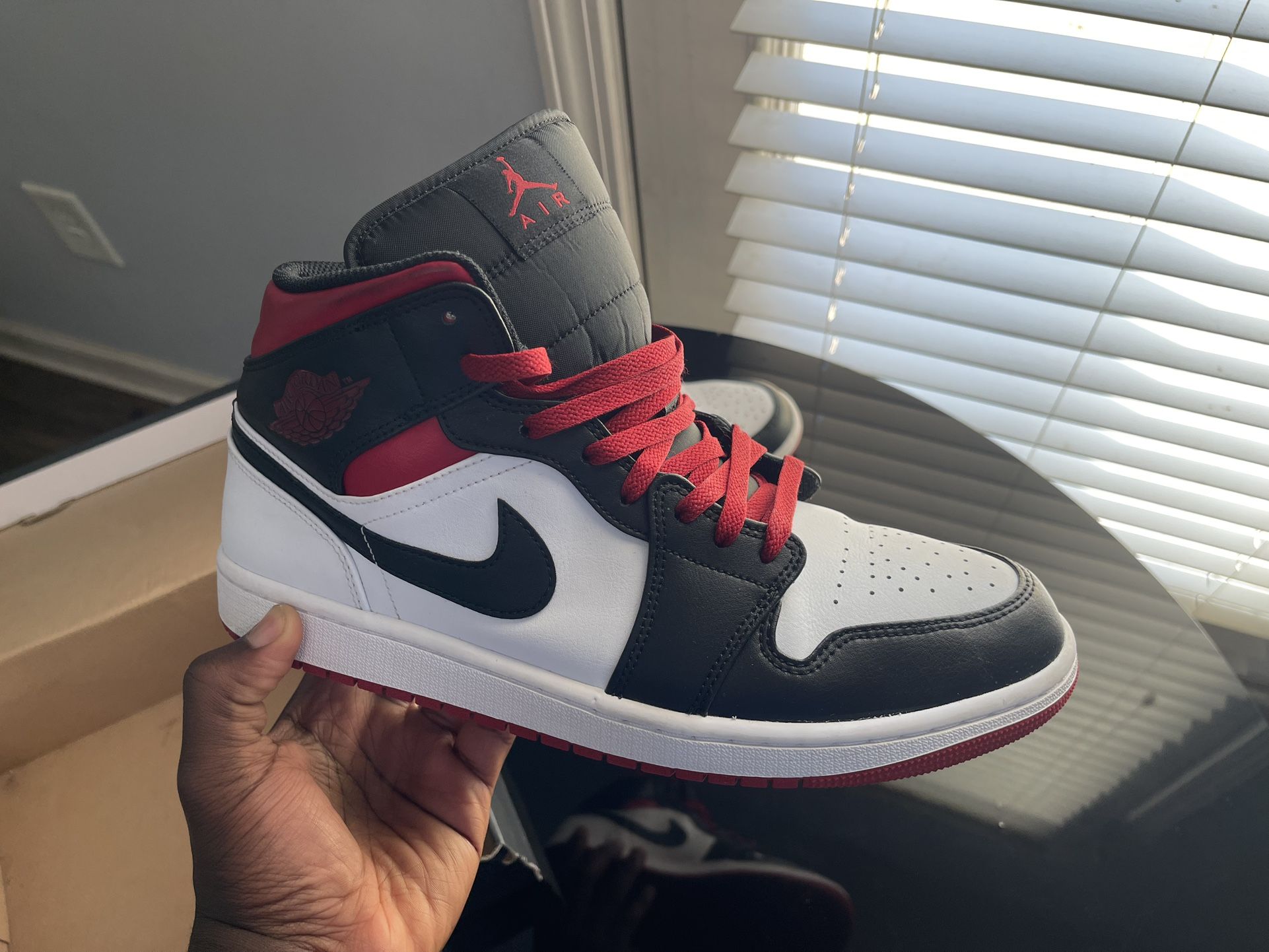 Nike Black And Red Air Jordan 1s Mid