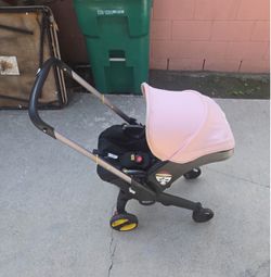 Pink Doona stroller