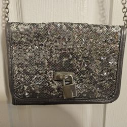 small, sequined handbag