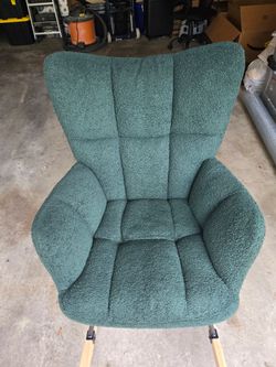 Dark green rocking chair