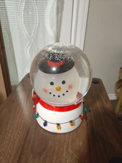 Light-Up Snowman Snow Globe Christmas Decoration – $15