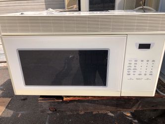 Beige over the range microwave oven