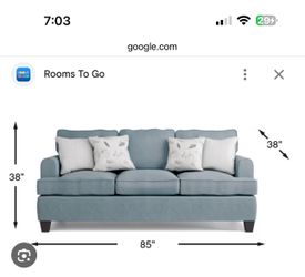 Blooming Grove Sofa with ottoman in excellent condition (from Rooms To Go)