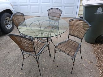 Pier 1 Imports glass top dining table with 4 chairs
