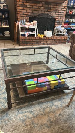 Glass top coffee table
